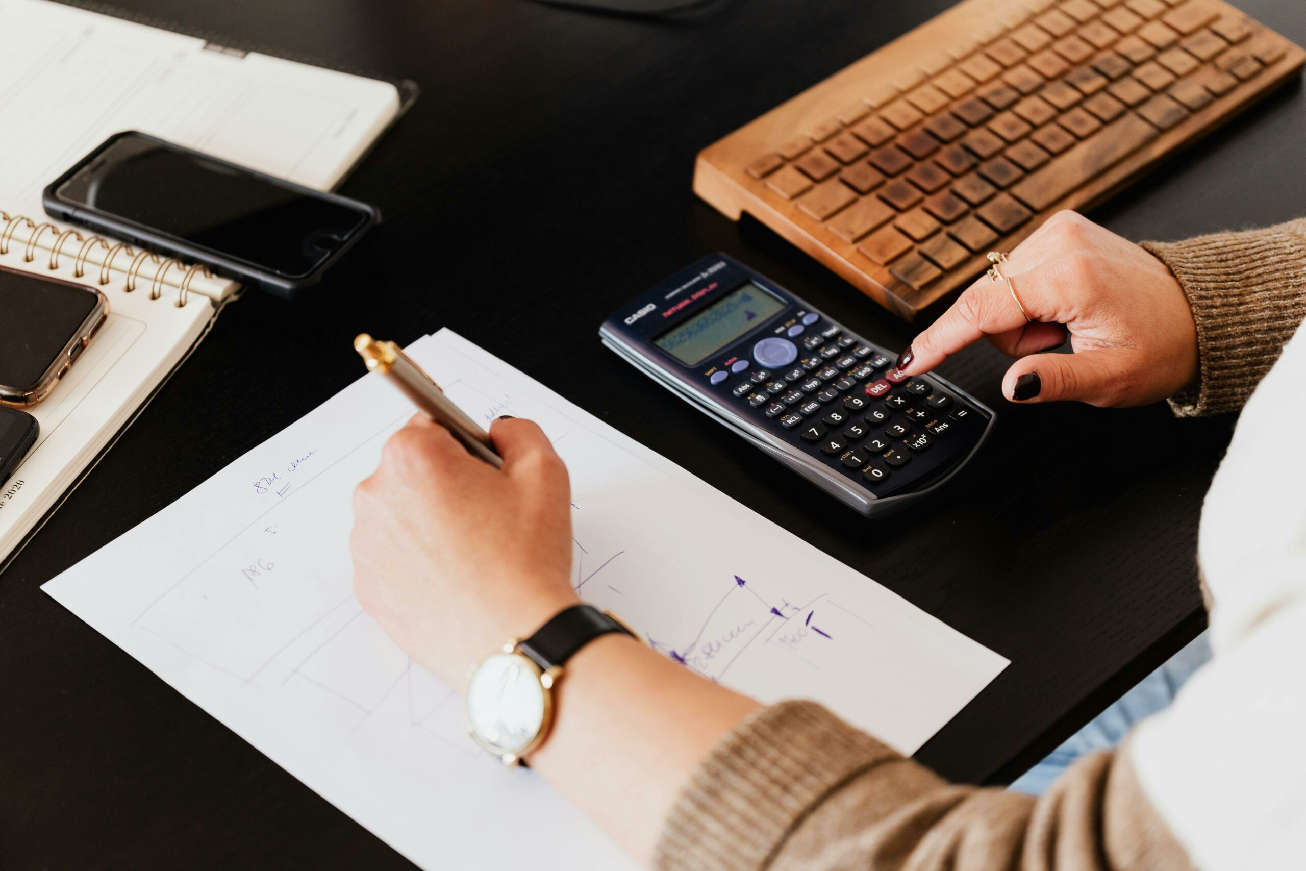 A bookkeeper works on calculations