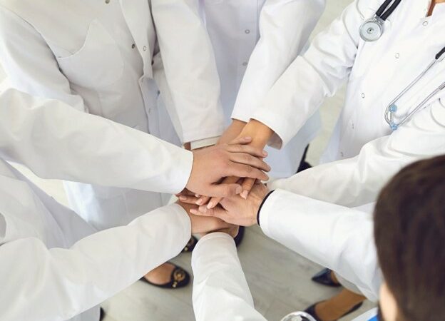 A group of medical professionals showing unity