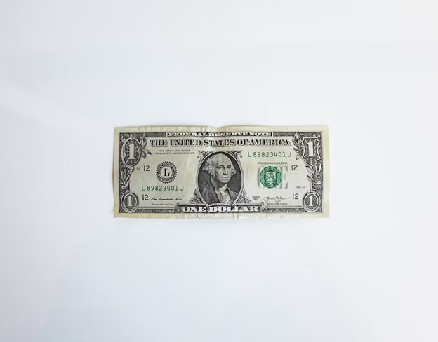A $1 bill on white background