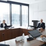 People sitting around a conference table